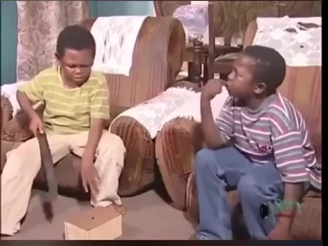 Black kid with knife crying