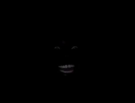 Black Man Laughing In The Dark