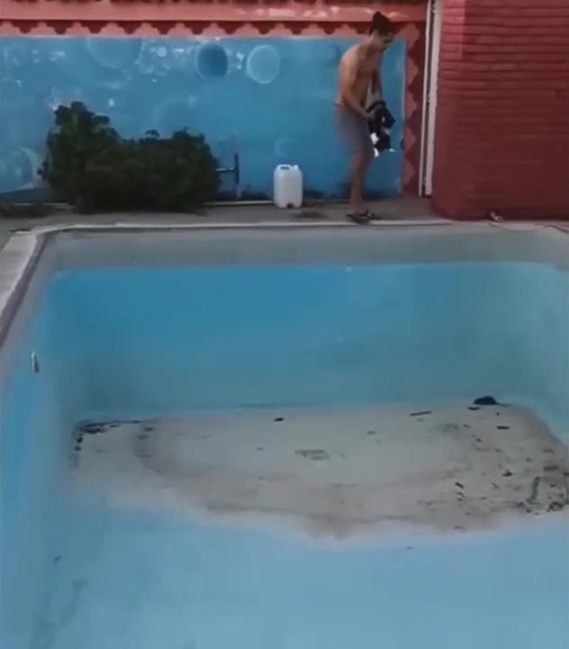 Daring Dive Into Empty Pool