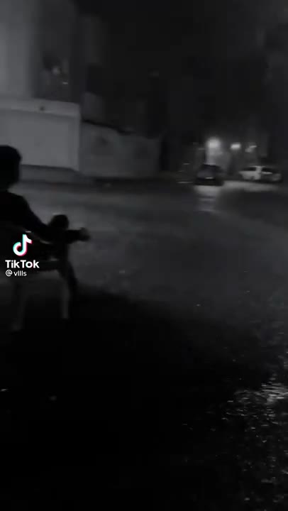 Guy Sitting In The Rain