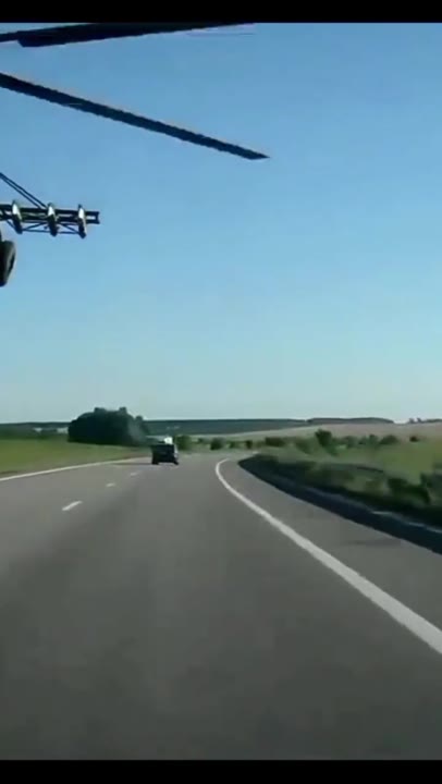 Helicopter Flying Over Highway