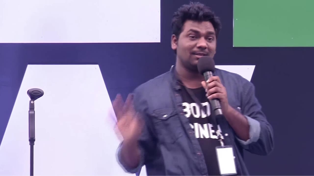 Man Laughing on Stage