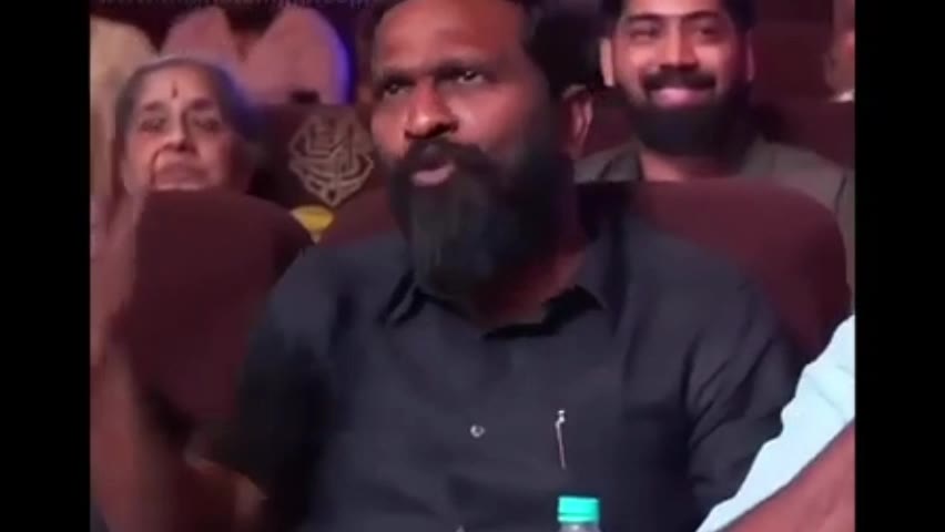 Man Laughs And Smiles