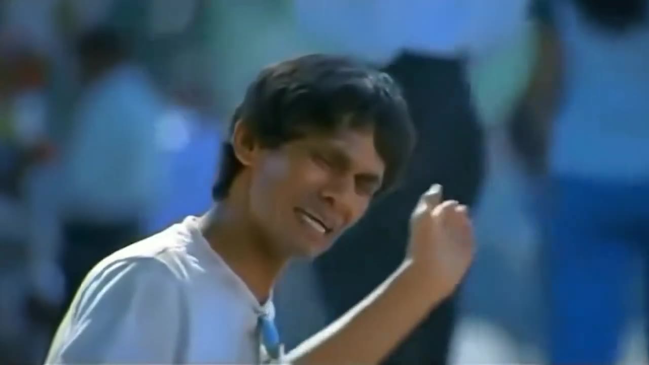 Man Shrugs While Laughing