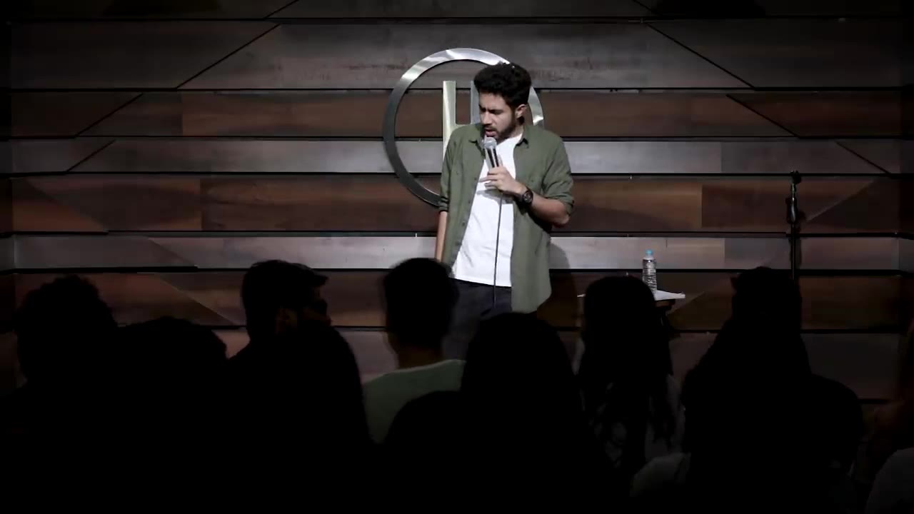 Man Speaking On Stage
