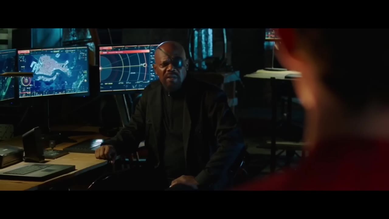 Nick Fury talking to Peter Parker