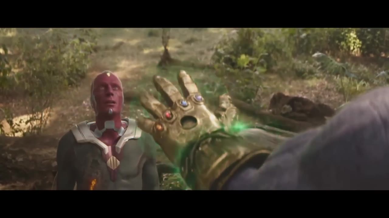 Thanos pulling out the mind stone