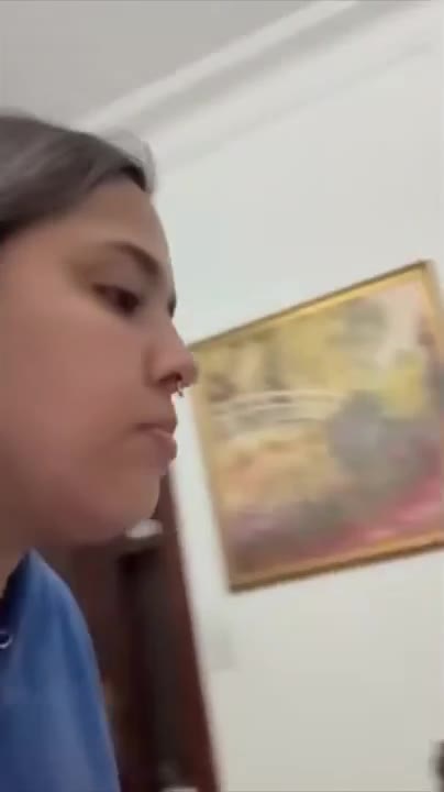 Woman Laughing At Cat